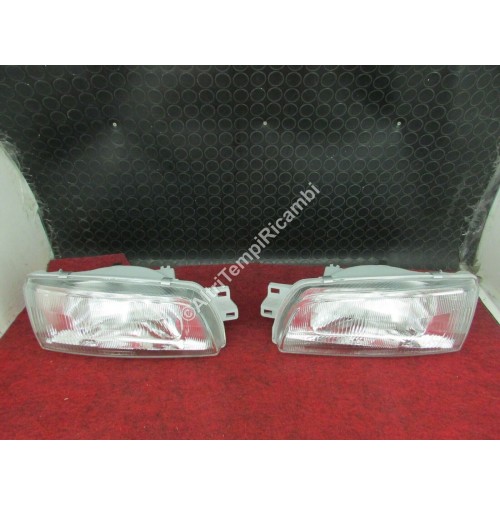 COPPIA FARI PROIETTORI ANTERIORI PER MITSUBISHI LANCER '93 214 - 1119 - LD - E