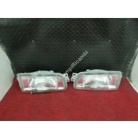 COPPIA FARO PROIETTORE ANTERIORI MITSUBISHI LANCER '93 4G92 C88A C13 C14A ELAR